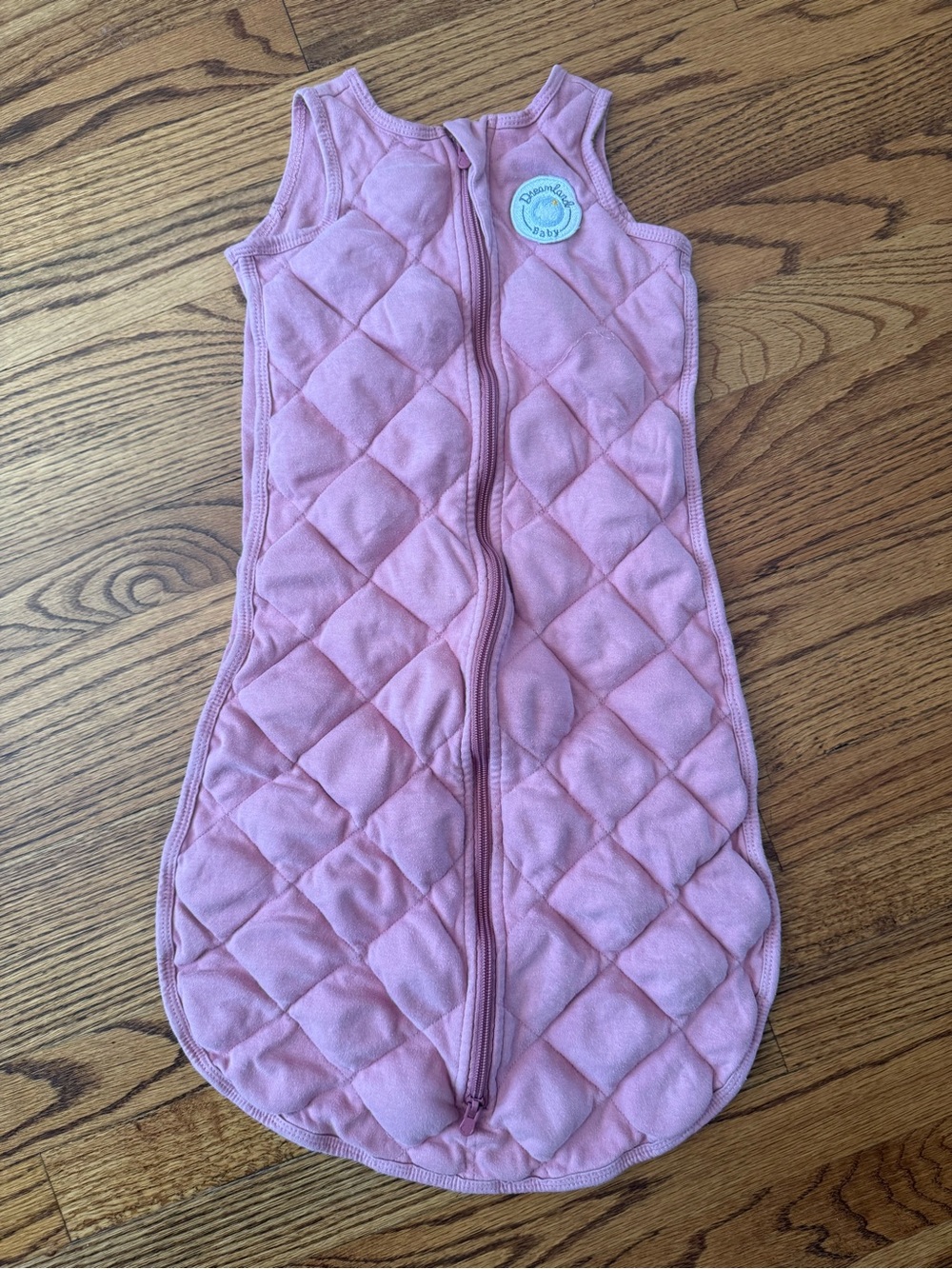 Light Pink Dreamland Baby Sleep Sack weighted
Size 6-12 months